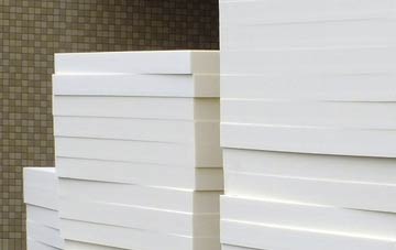 Began tapered roof insulation costs